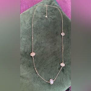 Grey natural stones on silver beaded chain.